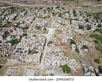 Aerial Drone View Of The Ruins Of Poggioreale On The Belice Valley, In The Province Of Trapani. The Town Was Destroyed By And Earthquake In 1968. Abandoned Empty Eerie Ghost Town In Sicily.