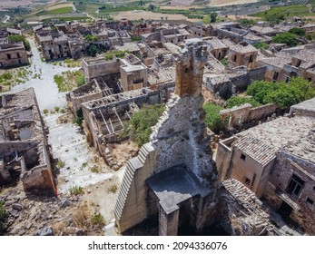 Aerial Drone View Of The Ruins Of Poggioreale On The Belice Valley, In The Province Of Trapani. The Town Was Destroyed By And Earthquake In 1968. Abandoned Empty Eerie Ghost Town In Sicily.