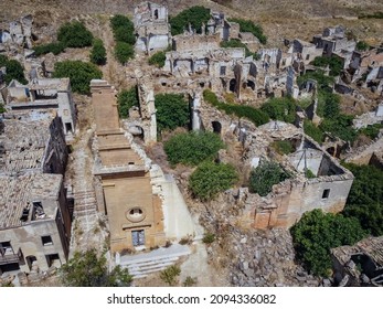 Aerial Drone View Of The Ruins Of Poggioreale On The Belice Valley, In The Province Of Trapani. The Town Was Destroyed By And Earthquake In 1968. Abandoned Empty Eerie Ghost Town In Sicily.