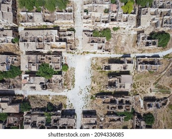 Aerial Drone View Of The Ruins Of Poggioreale On The Belice Valley, In The Province Of Trapani. The Town Was Destroyed By And Earthquake In 1968. Abandoned Empty Eerie Ghost Town In Sicily.