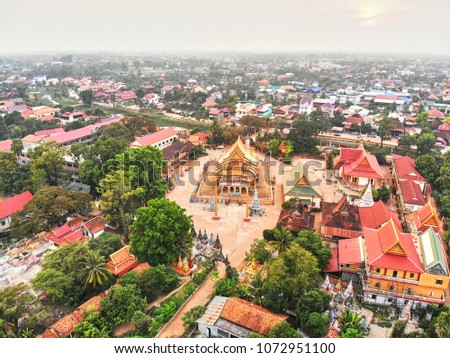 Aerial drone view topdown eagle eye of a traditionnal temple pagoda cemetery in siem reap cambodia asia