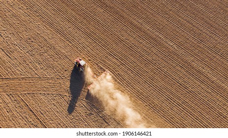 Aerial Drone View Of A Tractor Tilling The Land