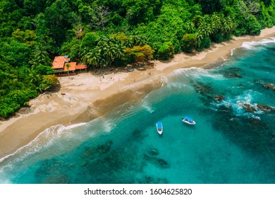 Aerial Drone View of a tropical island with lush jungle in Costa Rica, Isla del Caño - Shutterstock ID 1604625820