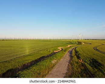 Aerial Drone. Wind Farm In The Fields In South East England. Wind Turbines Near Camber Sands And Rye, East Sussex.