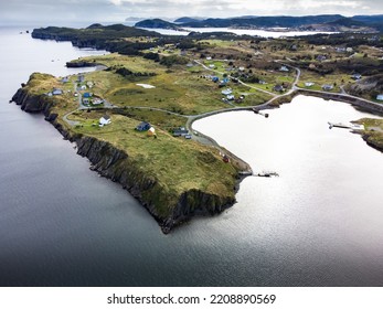 Aerial East Coast and Skerwink trail with small beach homes near Port Rexton Newfoundland Canada - Shutterstock ID 2208890569