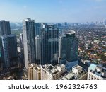 Aerial of Eastwood city skyline and cityscape along C5. Libis, Quezon City, Philippines.