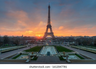 Aerial of the Eiffel tower with Paris cityscape during sunset - Powered by Shutterstock