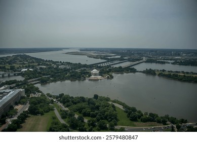 aerial elevated view of the Thomas Jefferson Memorial with the Potomac River and Ronald Reagan Washington National Airport in the background