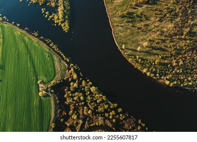 Aerial Flat View Green Meadow, Woods And River Landscape In Sunny Spring Day. Top View Of Nature, Bird's Eye View. Trees Standing In Water During Spring Flood floodwaters. woods in Water deluge During - Shutterstock ID 2255607817