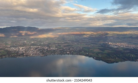 Aerial flight over the north shore of Lac Leman, a mountain lake in Geneva, Switzerland.