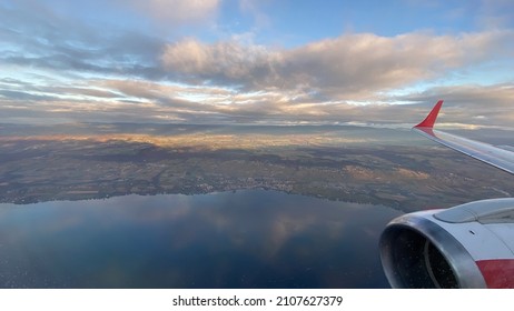 Aerial flight over the north shore of Lac Leman, a mountain lake in Geneva, Switzerland.