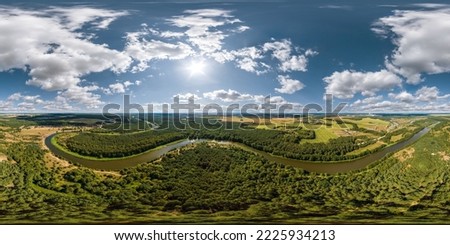aerial full seamless spherical hdri 360 panorama view over meandering river and forest in sunny summer day and windy weather with beautiful clouds in equirectangular projection, VR content