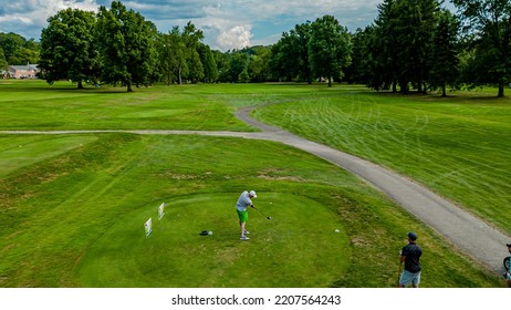 Aerial Golf Shot Down The Fairway On A Summer Day