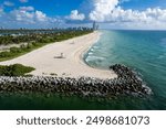 Aerial of Haulover Inlet and Beach Park, with the Sunny Isles skyline in the distance.