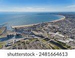 Aerial helicopter views over Swansea, Mumbles and the Gower Peninsular, Wales, UK
