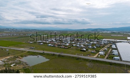Aerial High Angle View of Small Hobby Gardens and Tiny Houses in the Agricultural Lands Near Tahtali Dam Reservoir