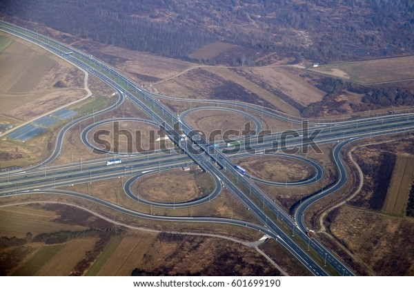 Aerial highway junction. Highway shape like number
8 and infinity sign.