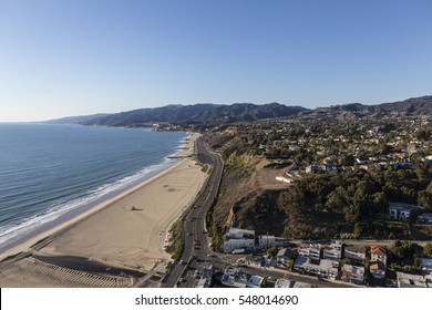 Aerial of homes, beaches and mountains in the Pacific Palisades area of Los Angeles California. - Shutterstock ID 548014690