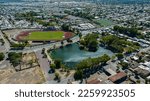 aerial horizontal photo with drone of the soccer stadium and lagoon  of the city center Los Angeles in chile
