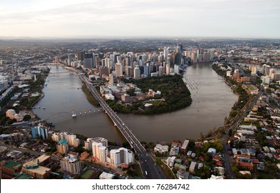 Aerial image of Brisbane at dusk and the Brisbane River meandering through the City, Queensland Australia