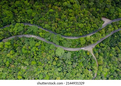 Aerial image in chopped plane of anchieta highway between closed Atlantic forest 
