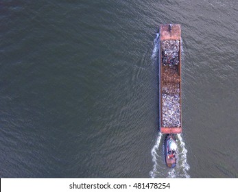 Aerial image garbage barge in the hudson river 