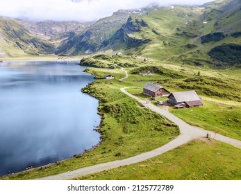 Aerial Image Of Hiking Path Along The Mountain Lake Over The Engelberg In Switzerland. It Is A Popular Recreational Area Offering Rich Outdoor Activities.