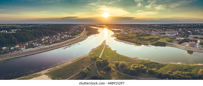 Aerial Image Of Kaunas City, Lithuania. Summer Sunset Scene. Confluence Of Two Rivers (Namunas And Neris)