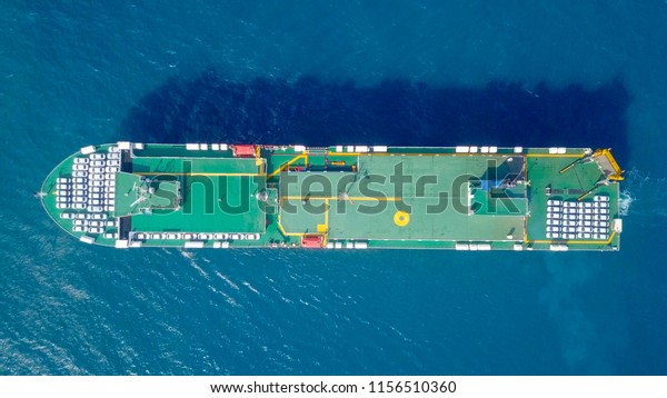 Aerial image of a Large RoRo (Roll\
on/off) Vehicle carrie vessel cruising the Mediterranean\
sea