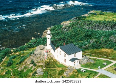 Aerial image of Lobster Cove Head Lighthouse, Newfoundland, Canada