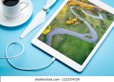 Aerial Image Of A Meandering River (Dismal River In Nebraska) Reviewd On A Digital Tablet