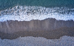 Aerial Image Of Pebble Beach Natural Background. Camera Looks Straight Down. Crete, Greece