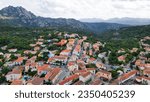Aerial image of San Pantaleo village  in Sardinia. Its history starts 800 years BC. Drone photo of a characteristic Gallura village in the heart of the Costa Esmeralda, island of Sardegna, Sassari.