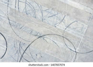 Aerial Image Tire Skid Marks In Concrete Parking Lot