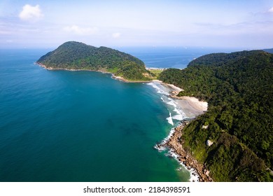 Aerial Image Of Tombo Beach, Located In The City Of Guarujá. Waves, Nature, Mountains And Bathers.