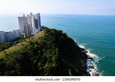 Aerial Image Of Tombo Beach, Located In The City Of Guarujá. Waves, Nature, Mountains And Bathers.