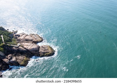 Aerial Image Of Tombo Beach, Located In The City Of Guarujá. Waves, Nature, Mountains And Bathers.