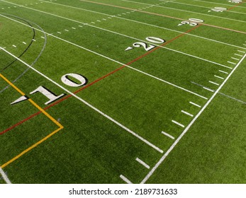 Aerial Image Of A Typical Synthetic Turf Football Field 10 Yard Line In White. 	