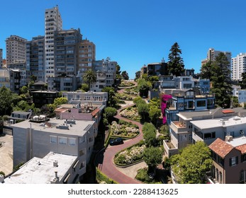 Aerial images of Lombard Street in San Francisco, California capture the iconic crooked street from a unique perspective. 