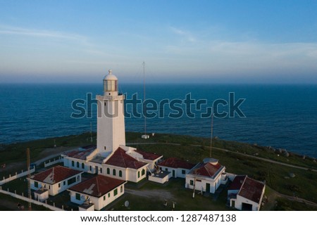 Aerial images of Santa Marta Lighthouse one of the most important in Brazil. Beautiful landscapes of Santa Catarina.
