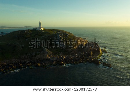 Aerial images of Santa Marta Lighthouse one of the most important in Brazil. Beautiful landscapes of Santa Catarina.

