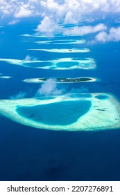 Aerial Indian Ocean Landscape With Reefs And Islands, Maldives
