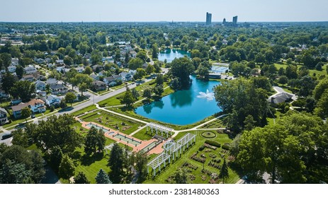 Aerial Lakeside Park gardens and fountains with distant downtown Fort Wayne