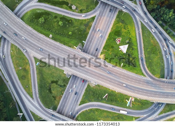Aerial landscape of busy highway junction road,\
Transport concept