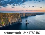 Aerial landscape with the Cliffs of Moher in County Clare at sunset, Ireland.