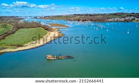 Aerial landscape image of River Median with Cowes in the background on a sunny day