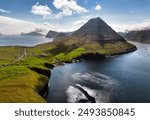 Aerial landscape photography. Amazing summer view from flying drone of Vidareidi village. Beautiful summer scenery. Sunny outdoor scene of Vidoy island, Faroe Islands, Denmark, Europe.