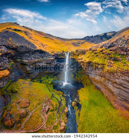 Aerial landscape photography. Awesome summer view from flyind drone of Kvernufoss watterfall. Superb morning scene of pure water river in Iceland, Europe. Beauty of nature concept background.