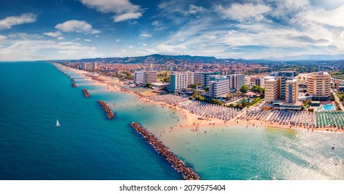 Aerial Landscape Photography. Splendid Summer View From Flying Drone Of Montesilvano Public Beach. Wonderful Morning Seascape Of Adriatic Sea, Italy, Europe. Vacation Concept Background.
