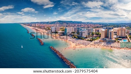 Aerial landscape photography. Splendid summer view from flying drone of Montesilvano public beach. Wonderful morning seascape of Adriatic sea, Italy, Europe. Vacation concept background.
